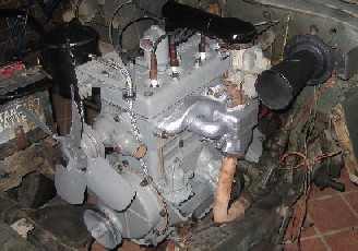 The engine back in the Jeep.
